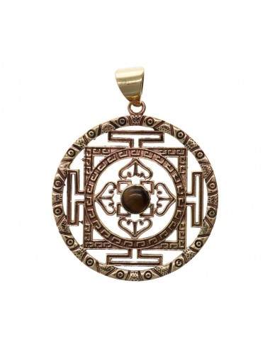 Pendentif en bronze avec symbole...