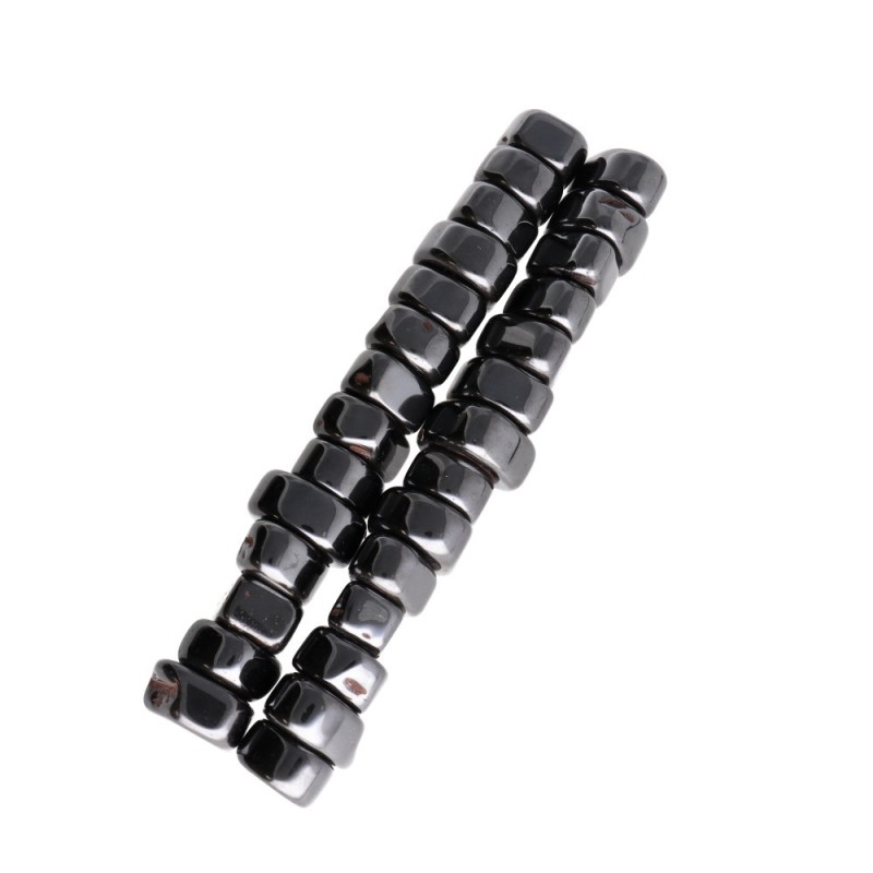 Ciottoli di magnetite

Alternative più formali o specifiche, a seconda del contesto:
- Sassi di magnetite
- Granuli/ghiaia di ma
