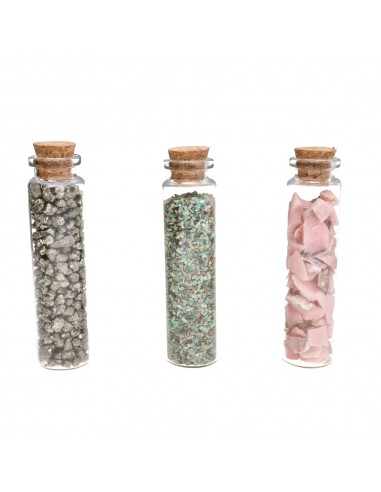 Frasco de cristal com lascas de pirite